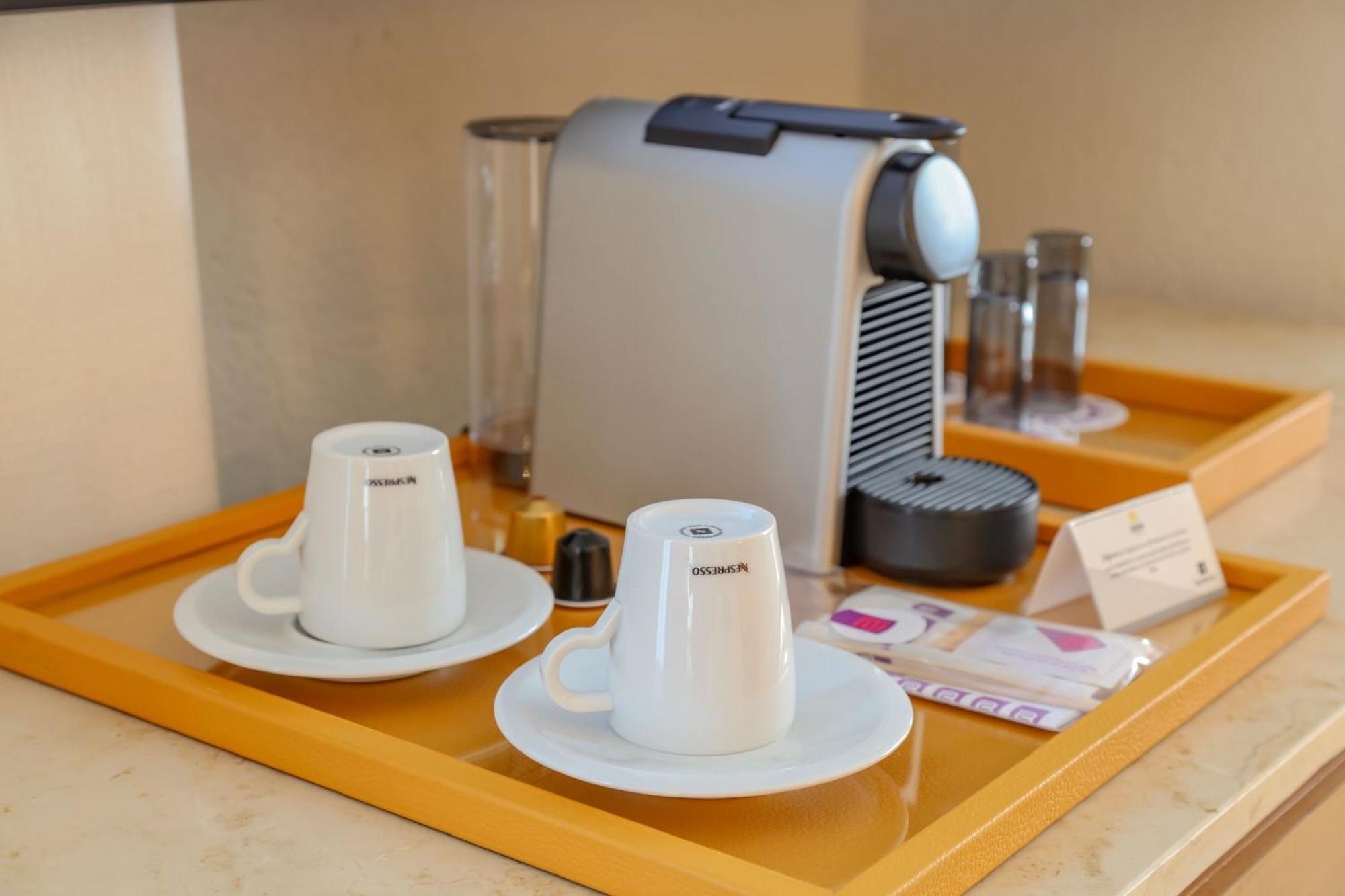 Camino Real Veracruz Exteriér fotografie A Nespresso coffee machine in a hotel room